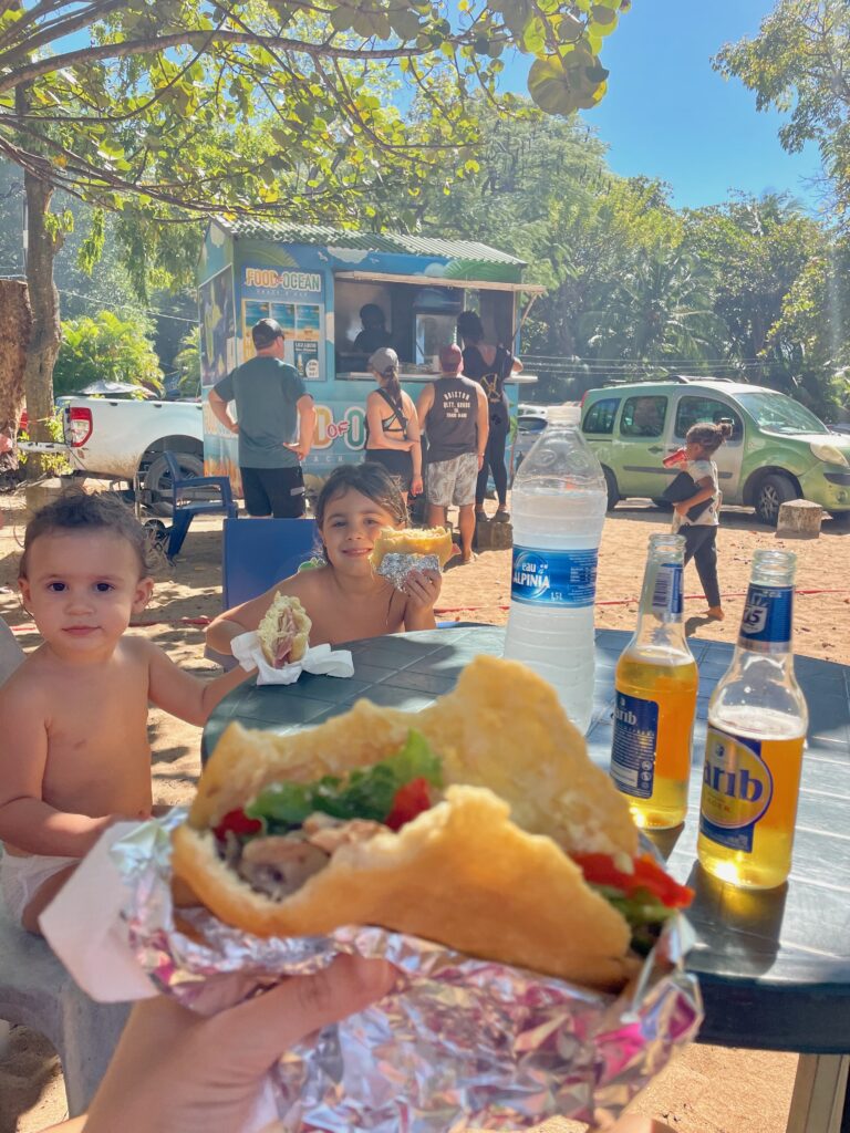 Bebe and Ginni eating their lunch on Grande Anse beach